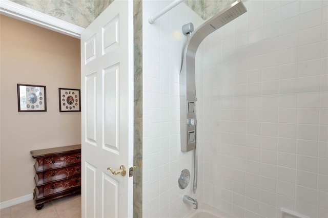 full bath with tile patterned floors, shower / tub combination, and baseboards