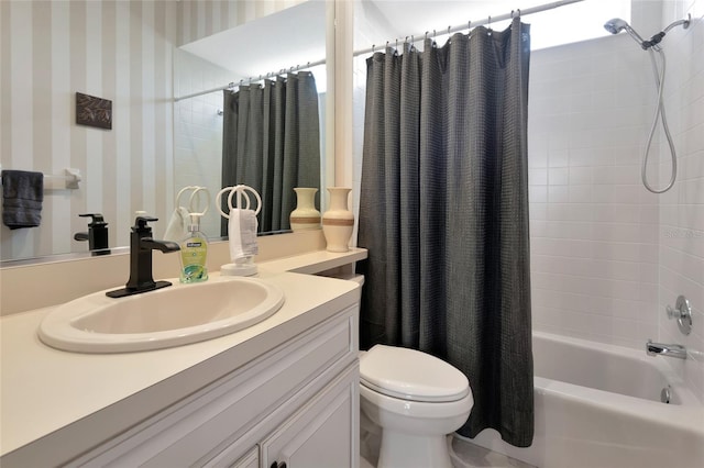 full bathroom with toilet, vanity, wallpapered walls, and shower / tub combo with curtain