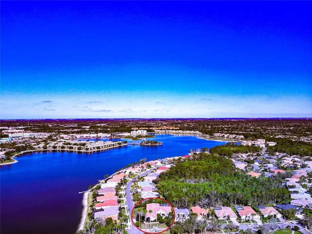 birds eye view of property featuring a water view