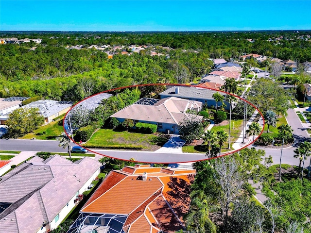 aerial view with a view of trees and a residential view