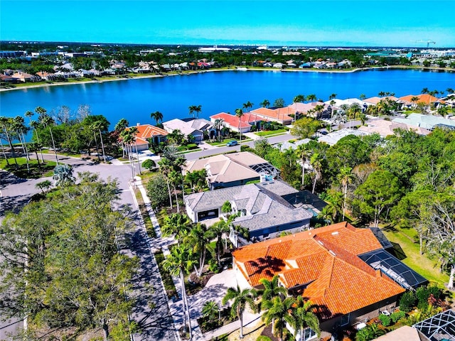 aerial view with a residential view and a water view