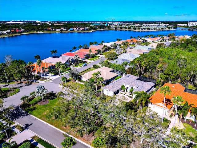 bird's eye view with a residential view and a water view