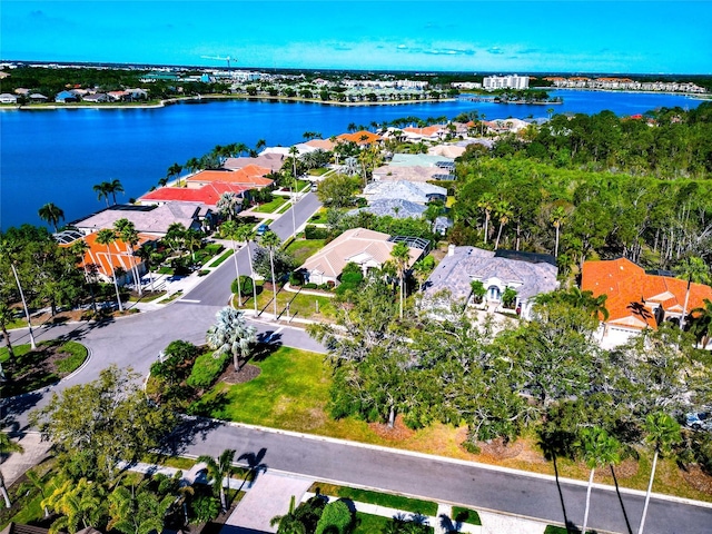 bird's eye view with a water view and a residential view