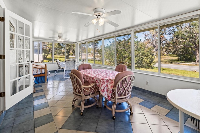 sunroom / solarium featuring a healthy amount of sunlight