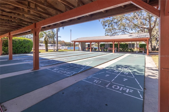 view of home's community with shuffleboard