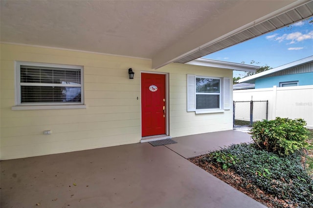 property entrance featuring fence