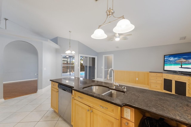 kitchen featuring light tile patterned floors, arched walkways, a sink, a ceiling fan, and dishwasher