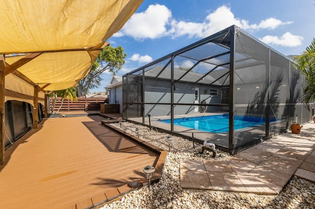 outdoor pool featuring a lanai