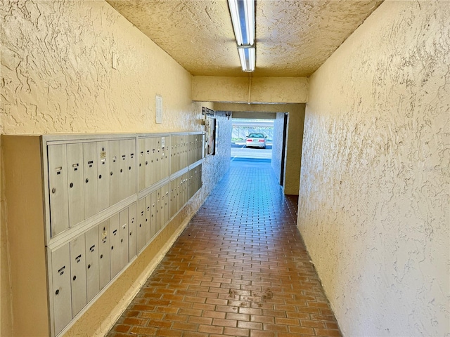 corridor featuring mail area