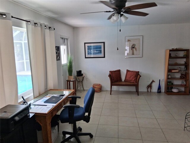 3013 Yarmouth Dr W, Bradenton, FL 34205 - home office with ceiling fan and light tile patterned floors