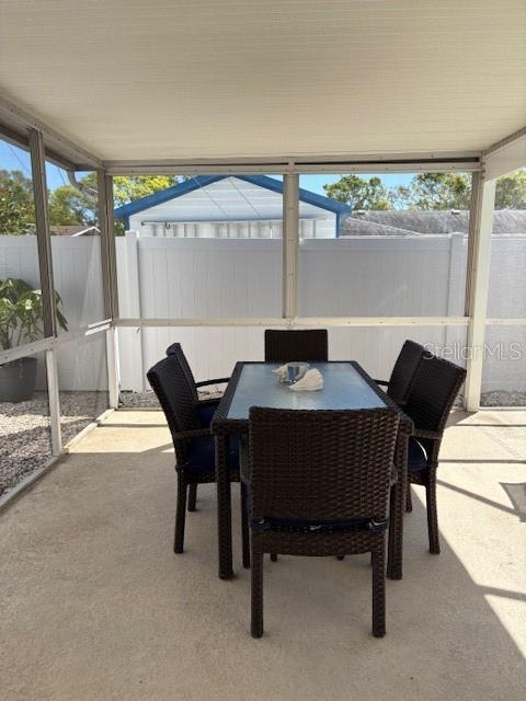 3013 Yarmouth Dr W, Bradenton, FL 34205 - sunroom / solarium with outdoor dining space