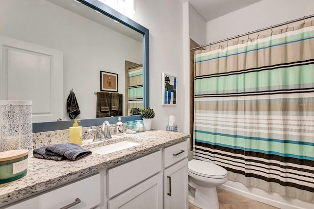 full bathroom featuring toilet, shower / tub combo, vanity, and tile patterned floors