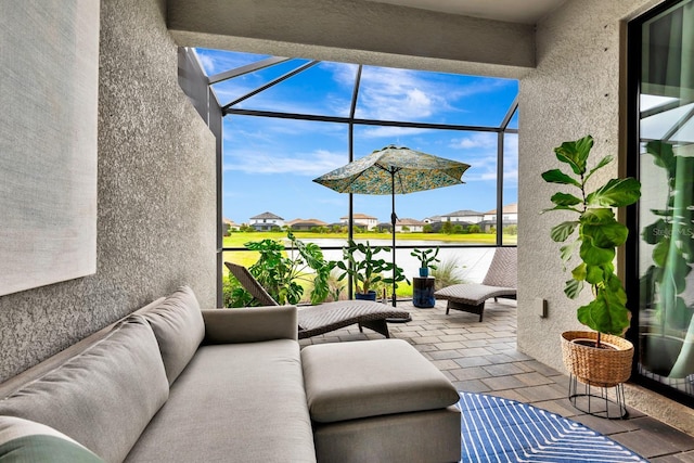 sunroom / solarium with a residential view