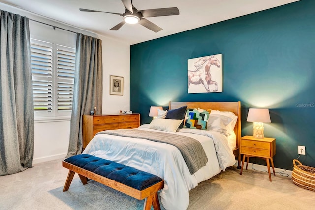 bedroom featuring ceiling fan, baseboards, and carpet flooring