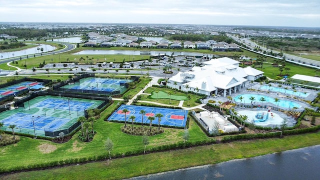 bird's eye view with a water view