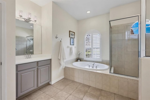 full bath featuring vanity, a shower stall, a bath, and tile patterned floors