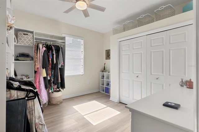 interior space featuring ceiling fan and light wood-style floors