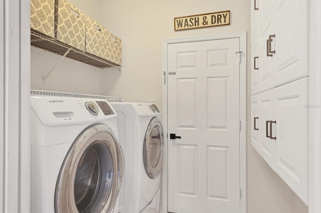 laundry room featuring laundry area and washer and dryer