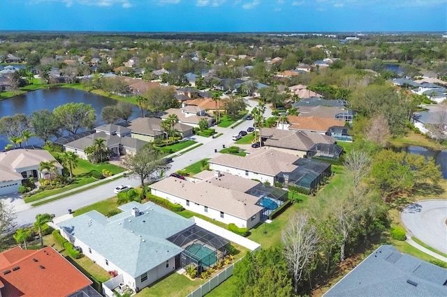 aerial view with a water view and a residential view