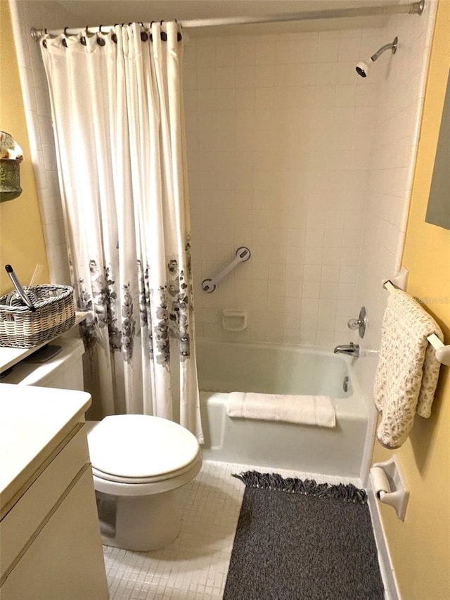 full bath featuring toilet, shower / bathtub combination with curtain, vanity, and tile patterned floors