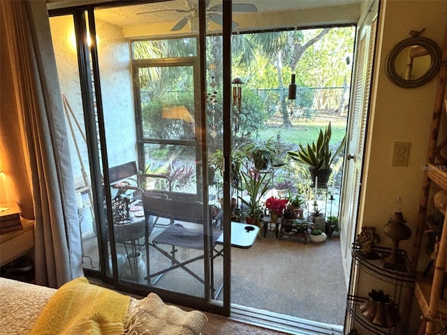 entryway with a ceiling fan