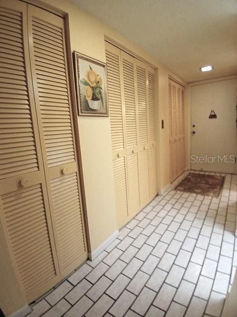 6012 Oak Creek Ln Unit 1913, Bradenton, FL 34210 - corridor with baseboards and recessed lighting