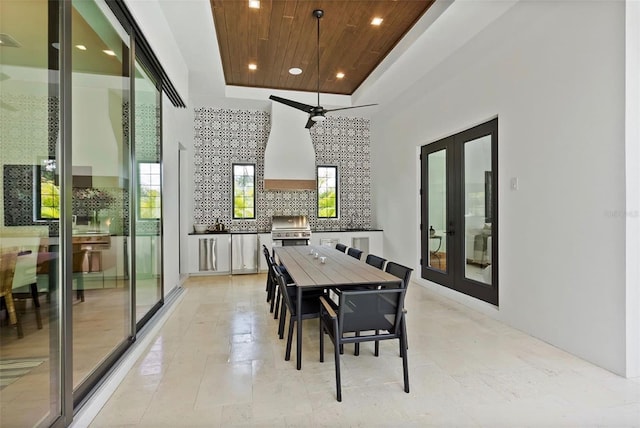 dining room featuring recessed lighting, wood ceiling, a raised ceiling, and french doors