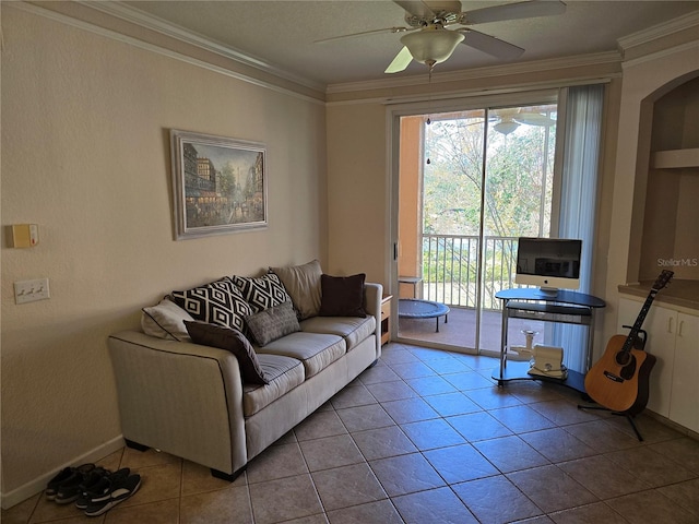 living area featuring tile patterned flooring, crown molding, baseboards, and ceiling fan