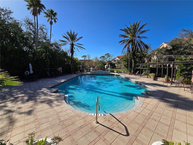 community pool featuring a patio