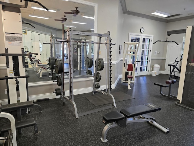 workout area featuring ornamental molding, french doors, ceiling fan, and baseboards