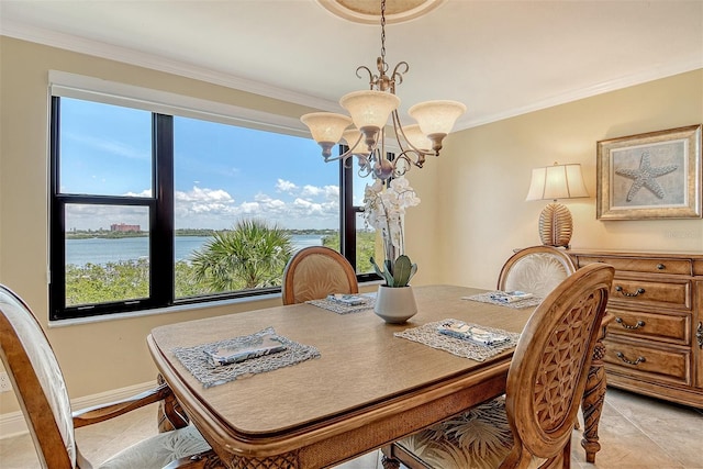 8779 Midnight Pass Rd Unit 406H, Sarasota, FL 34242 - dining area with a chandelier, ornamental molding, baseboards, and a water view