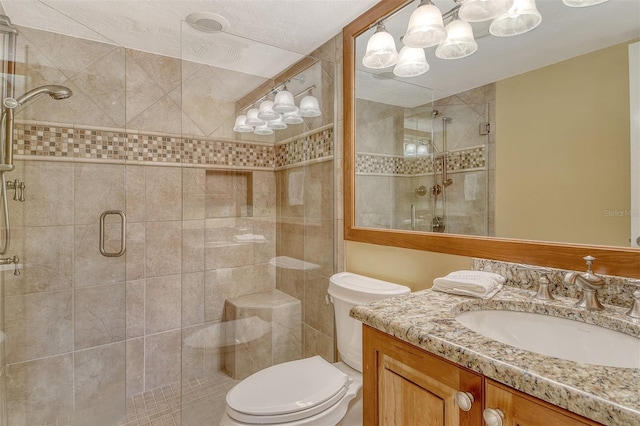 8779 Midnight Pass Rd Unit 406H, Sarasota, FL 34242 - bathroom featuring vanity, toilet, a shower stall, and a chandelier