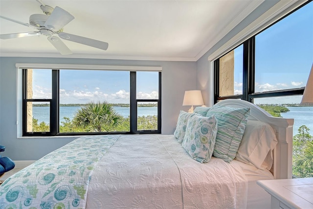 8779 Midnight Pass Rd Unit 406H, Sarasota, FL 34242 - bedroom featuring a water view, ornamental molding, multiple windows, a ceiling fan, and baseboards
