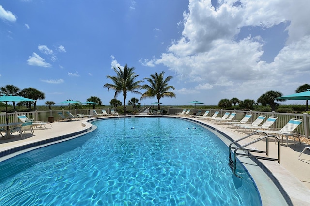 8779 Midnight Pass Rd Unit 406H, Sarasota, FL 34242 - community pool with a patio area