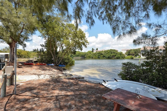 8779 Midnight Pass Rd Unit 406H, Sarasota, FL 34242 - dock area featuring a water view