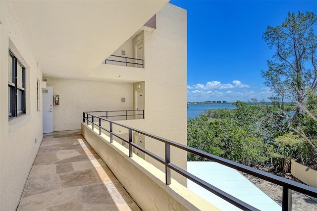 8779 Midnight Pass Rd Unit 406H, Sarasota, FL 34242 - balcony featuring a water view