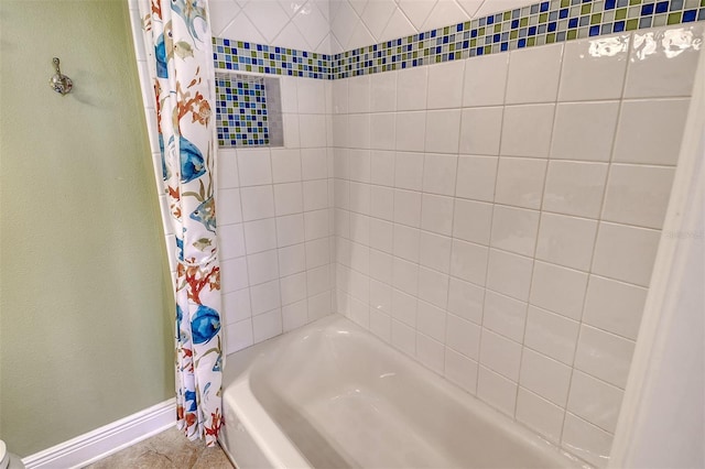 8779 Midnight Pass Rd Unit 406H, Sarasota, FL 34242 - bathroom with baseboards and shower / bathtub combination with curtain