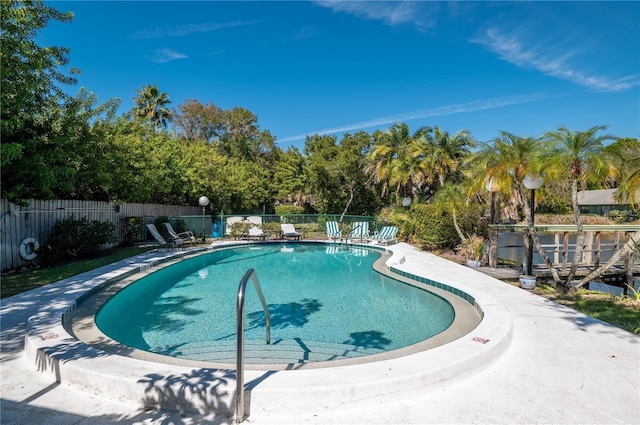 community pool with fence