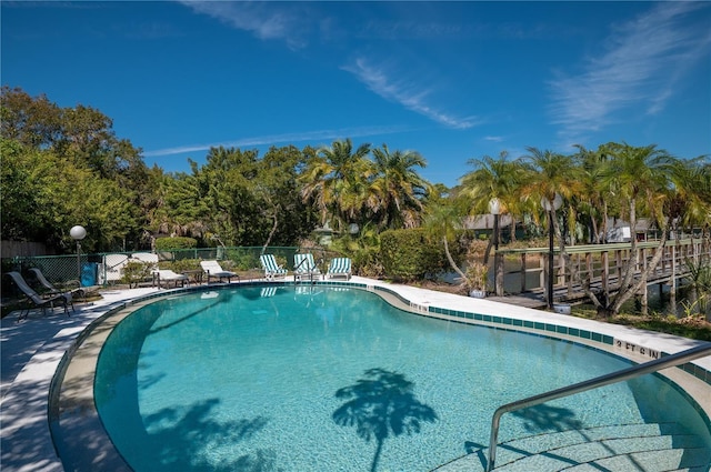 pool featuring fence