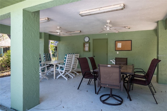 view of patio / terrace with a ceiling fan and outdoor dining area