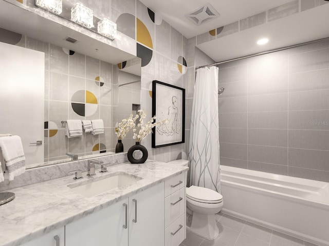 full bath with tile patterned flooring, toilet, vanity, and visible vents