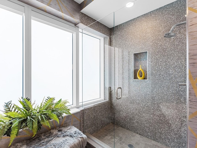 full bathroom featuring a shower stall