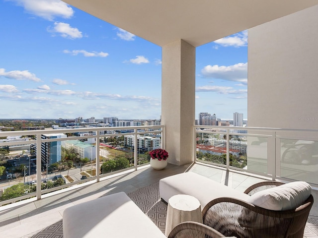 balcony featuring a city view