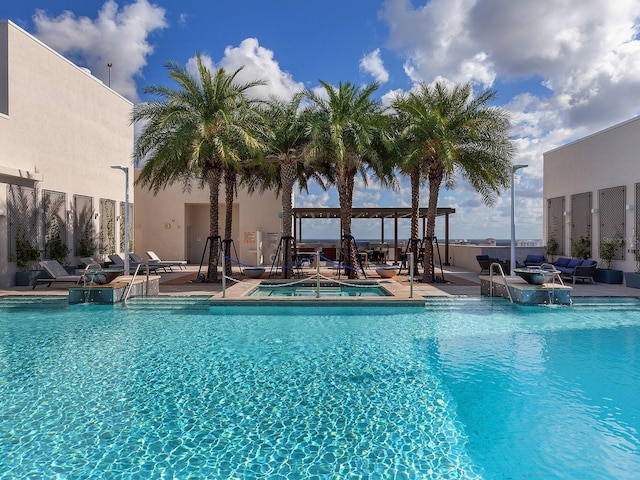 pool featuring a patio area