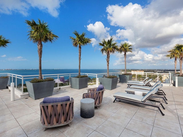 view of patio / terrace with a water view