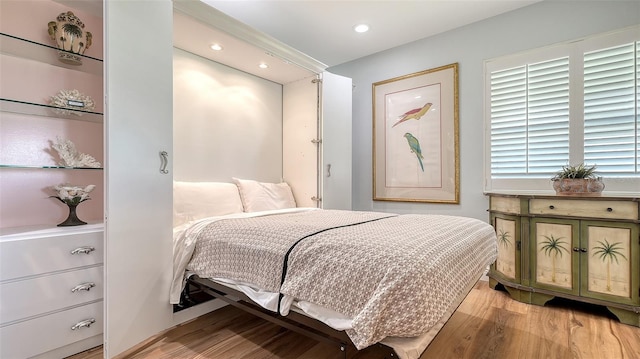 bedroom featuring recessed lighting and light wood finished floors