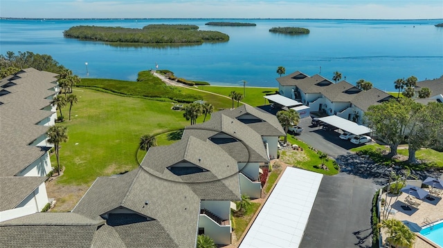 birds eye view of property with a residential view and a water view