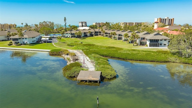 aerial view with a residential view and a water view