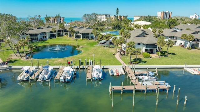 aerial view with a water view and a residential view