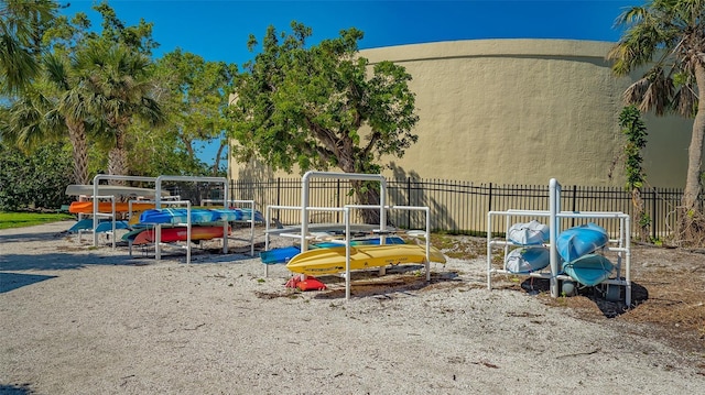 view of playground featuring fence